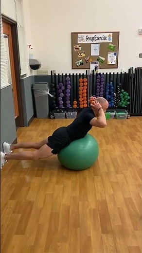 DB Back Extension - Dumbbell Back Extension