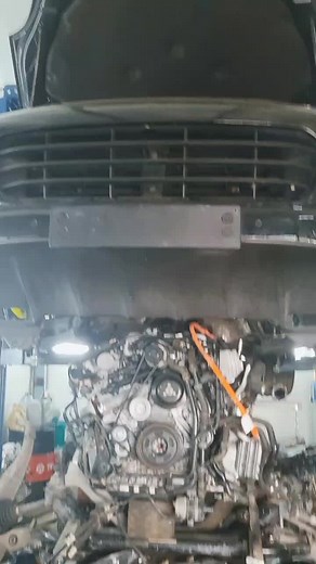 Close-Up Engine Parts Exploration: Garage Insights