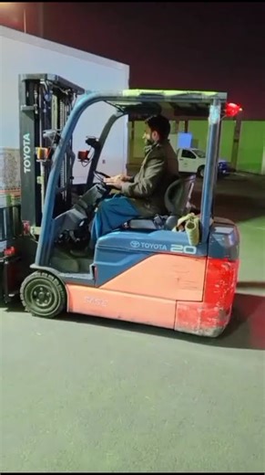 fork lift driving on duty