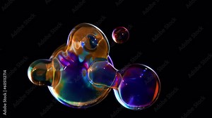 A metaball animation that transforms liquid blobs. 3D Abstract multicolor Metaballs on a black background. Ultra HD in 4K. a smooth, looped 3D animation.