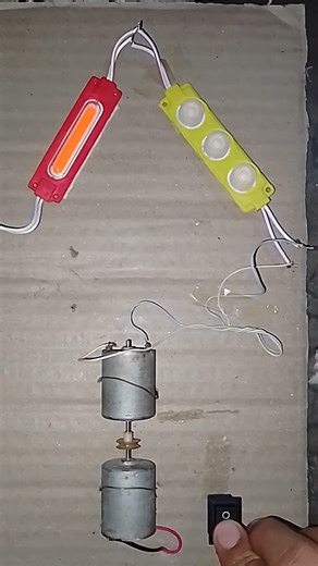 Powering an LED light by rotating one motor to another. #dcmotor #tech #youtubeshorts #shorts