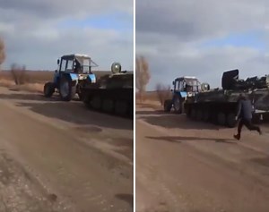 Ukrainian Farmer Seen 'Stealing' Russian Armored Vehicle That Ran Out of Fuel in Viral Video