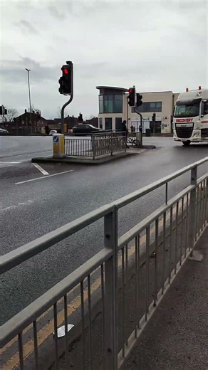 Daf With burnt out bus on low loader