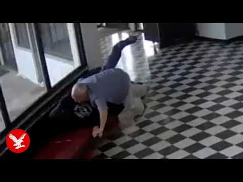 Moment hero principal disarms student threatening to shoot up school