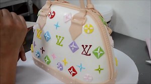 4.5M views · 58K reactions | Louis Vuitton Purse Cake By: Pastry Palace | MetDaan | Facebook
