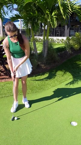 Playing a mini golf hole designed by Tiger Woods