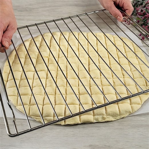 Not a Recipe, but a TREASURE 🥖✨ This Bread Trick Took the Internet by Storm! 🕒 Prep Time: 20 mins ⏳ Rest Time: 30 mins 🔥 Bake Time: 25–35 mins 🍞 Yield: 1 large tray bread 🧾 Ingredients Dough Warm water: ¾ cup (200 ml) Warm milk: ¾ cup (200 ml) Sugar: 1 tablespoon Dry yeast: 2¼ teaspoons (8 g) Egg white: from 1 large egg Vegetable oil: ⅓ cup (90 ml) All-purpose flour: 5 cups (600 g approx.) Salt: 1 teaspoon Filling Grated cheese (mozzarella or mixed): 1½ cups (150 g) Topping Egg yolk: 1 Milk