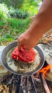 Juicy meat pocket filled with spices, cheese, and veggies – sizzled in a hot pan, showcasing the melting flavors inside. #OutdoorCooking #StuffedMeat #SizzlingPan #Cooking | Cook Loop
