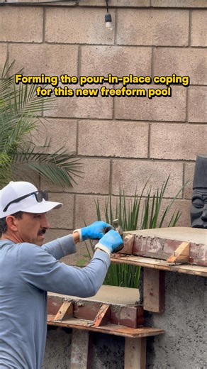 Forming the pour-in-place coping for this new freeform pool
