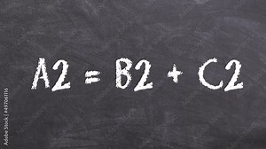 Animation of the Pythagorean Theorem. Pythagoras formula being written on a blackboard with chalk. Mathematical animation for scientific and educational videos. Digital compositing for schools