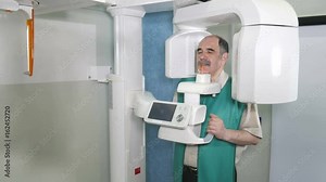 Process of examination of the patient by using panoramic and cephalometric X-Ray scanner Stock Video