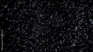 Blizzard winter snowfall particles loop animation background, moving through heavy snowfall, snow particle mist spray loop animated effect on black background Stock Video