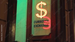 currency exchange office dollar vs euro sign .night neon illuminated. forecast