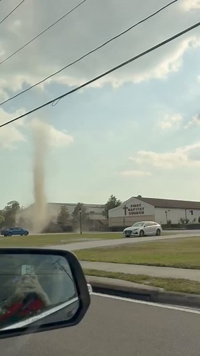 Dust devils look like mini tornadoes. They're not and actually develop during fair weather. Cool, either way. | Denis Phillips