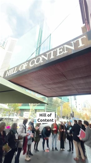 Throwback 2025: Hundreds of book lovers formed a human chain to help Melbourne's oldest bookshop, Hill of Content, move to a new home on a rainy winter day this week. Community members moved over 16,000 books one by one to help the shop relocate after 103 years, 120m up the road. [Originally posted in July 2025]