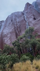 Rain and thunderstorms have drenched parts of central Australia in the last couple of days, causing waterfalls to cascade down the sides of Uluru following the monolith’s best September rain on record. Full story at https://bit.ly/3ZyF7kU 🎥 Video via @rachelcrowley_ / IG | Weatherzone