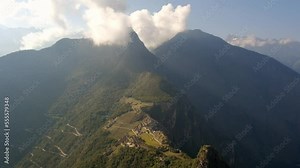 Clouds Move Above Machu Picchu Mountain Range, Sacred Valley Aerial Time Lapse at Peruvian Inca Citadel, Indigenous Archaeological Site