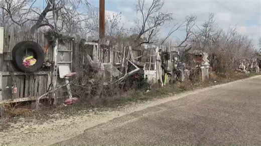 San Antonio landowner battles city over 'junk art wall' and building code compliance