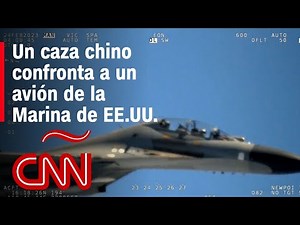 Un caza chino confronta a un avión de la Marina de EE.UU.