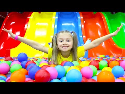 Let’s learn how to go down the slide, jump on trampoline into colorful toy blocks