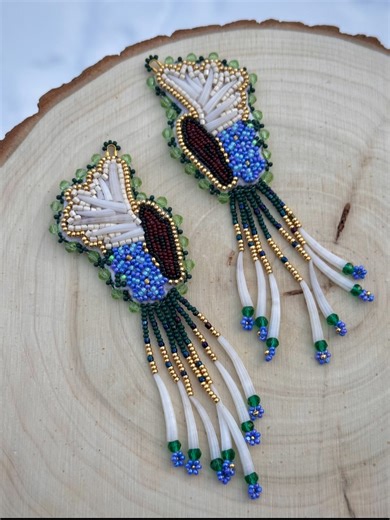 Interior Rose Design | Moose/Forget-Me-Not Earrings Dentalium shells, charlotte cut, gold beads, and backed w/ moosehide | Instagram