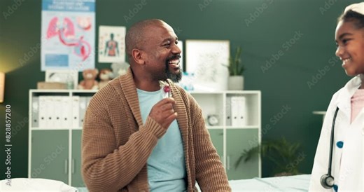 Child, doctor and costume in clinic with father, patient and medical exam game at hospital. Happy, smile and youth with healthcare employee and surgeon dress up for role play and fantasy of dream job