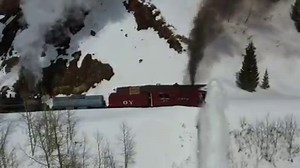 What a magnificent sight! The Cumbres & Toltec ran a rotary snowplow from Chama to Cumbres Pass yesterday. It was the first time a rotary snowplow has run in the Rockies in 20 years. The event was in celebration of the 140th anniversary of the year the railroad was built (1880) and the 50th anniversary of the year the railroad was purchased by the states of Colorado and New Mexico (1970) to operate as a living history museum, preserving and interpreting steam railroading. Video from Roger Hogan.