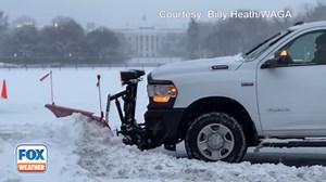 Watch: Plow clears road in front of the White House in Washington, D.C.