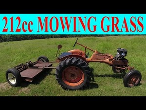 mowing tall grass with a 212cc allis chalmers tractor