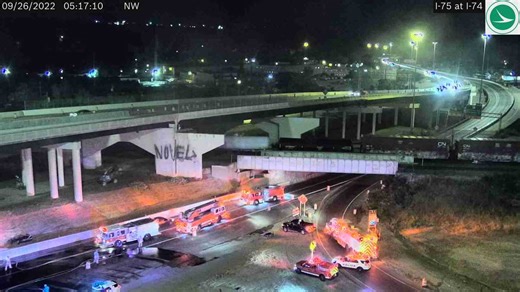 Police close ramp on the interstate after a crash and vehicle fire