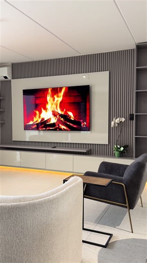 Elegant Full Wall TV Unit for a Balanced Living Room