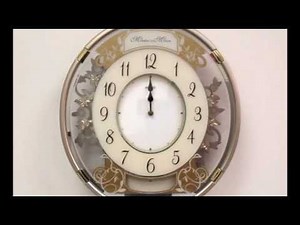 Seiko Silver & Gold Melodies in Motion Christmas Clock QXM271GRH