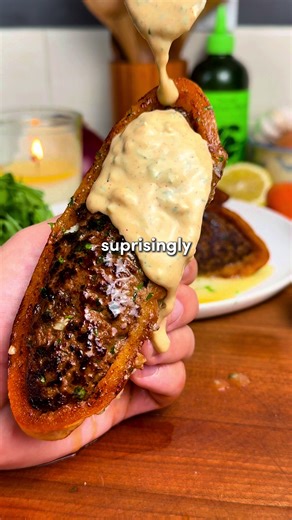 Arayes🔥 Crispy, Juicy Middle Eastern Meat-Stuffed Pitas with a Garlic Tahini Sauce 🥙 Since all of you are asking - the app link for Osta is in my bio or you can search “Osta Recipes” on the App Store or Google Play store ‼️🫶 Ingredients: -4 small pitas, cut in half -1 yellow onion, grated & squeezed dry -7 garlic cloves, minced -2 tbsp tomato paste -1/3 cup fresh parsley, chopped -1/3 cup fresh cilantro, chopped (optional but excellent) -1 tbsp olive oil -1 lb (0.45 kg) lean ground beef -Spic