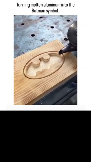 funfunny🤣 on Instagram: "The post shares a 19-second viral DIY video of pouring molten aluminum (at ~700°C) into a carved wooden mold to form a Batman symbol, followed by sanding, polishing, and orange wood staining for a high-contrast inlay effect. With 3,000+ likes and 2.5 million views in one day, it taps into the satisfying ASMR appeal of metal casting, a trend popularized on platforms like YouTube and Instagram by creators demonstrating accessible aluminum work due to its 660°C melting poi
