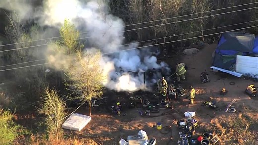 Fire at homeless encampment in southwest OKC causes heavy smoke
