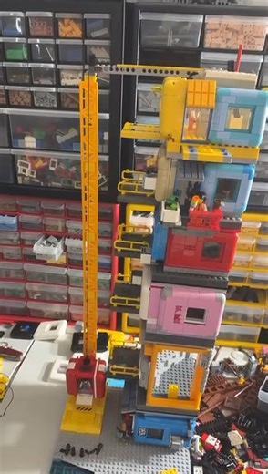 9.2K views · 76 reactions | In my free time I’ve been building my cube towers. I’m almost finished with tower #1 . There’s a store on the ground level. A train station on level 2. Floors 3-5 are apartments with full interiors and floor # 6 is the elevator/water pump station. I’m going to have a spinning water tower. Today was the first test run of the elevator. Let me know what you think. from Luis Sanchez | Bad Bricks | Facebook