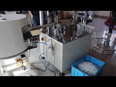 Adaptor dip tube fitting machine