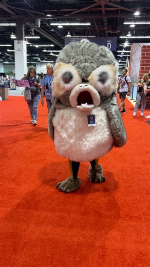A Porg (a guest in costume) just walked by at #D23Expo #porg | Mousesteps