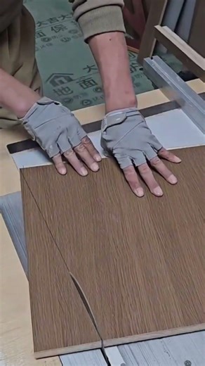 Cutting and slicing a wooden board precisely daily using a professional electric industrial table