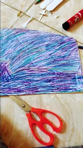 how to make a paper dragon puppet