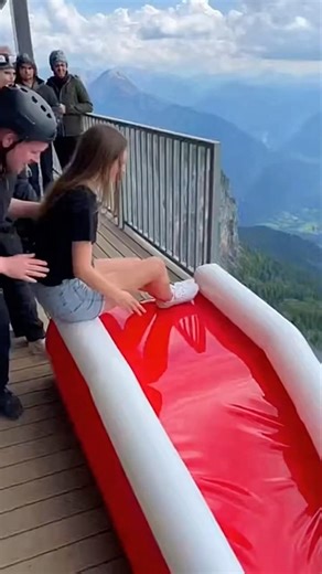 Red Cliff Slide is Thrill! 😱🔥 Girl Slides, then Bounces on Cliff Airbag #cliffactivity #cliffslide