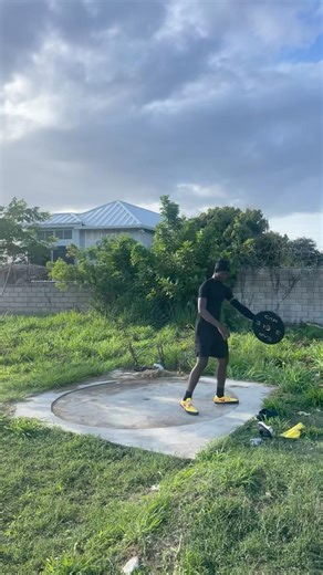 Discus practice with a 15lb barbell plate