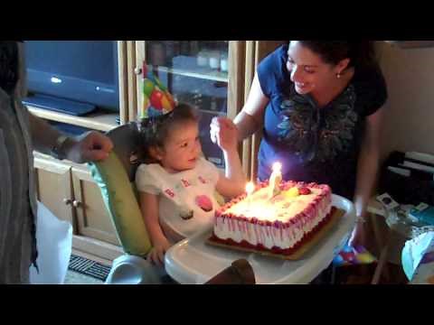 Kaylee blowing out her Birthday candles