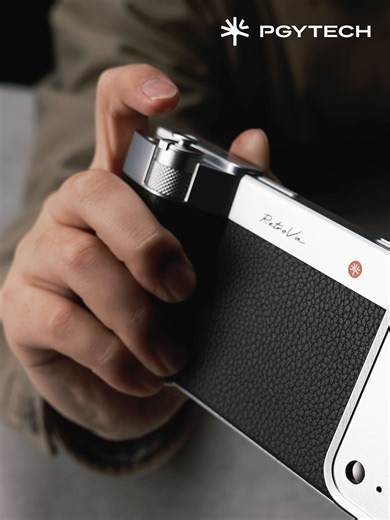 Transform your phone into a camera — add the RetroVa Grip.📱➡📸 Reach beyond limits with the 2.35× Master Telephoto Extender — up to 2350mm equivalent true optical zoom. 🔭 Switch focal lengths freely with physical controls. Record directly to a MicroSD card for unlimited shooting. 💾 Attach a photography strap and carry it like a real camera. What will you shoot first when your iPhone becomes a true camera? 🤔👇 #PGYTECH #RetroVa #Kickstarter #VintageCamera #iPhonePhotography | PGYTECH Global