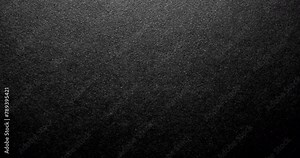Black rough paper surface, slow moving. Use for background and texture.