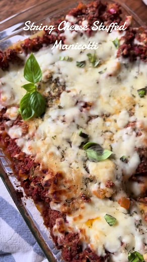 String Cheese Stuffed Manicotti What you’ll need: * \t\t1 package, (8 ounces) manicotti shells * \t\t1 pound ground beef * \t\t1/2 cup season blend * 1 tsp oregano * \t\t1 garlic clove, minced * Salt pepper * 1 tsp dried parsley * \t\t1 jar, (24 ounces) spaghetti sauce * \t\t12 pieces string cheese * \t\t1-1/2 cups (6 ounces) shredded part-skim mozzarella cheese * \t\tgrated Parmesan cheese * \t\t(optional) basil, chopped What you’ll do: * \t\tCook manicotti according to package directions in sa