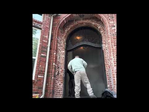 Iron door with transom installation