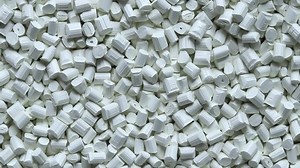 top view of white plastic resin ( Masterbatch ) rotation background
