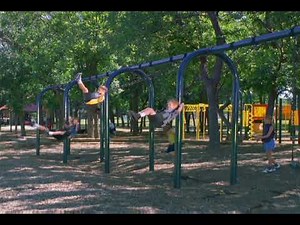 Baby Einstein Stock Footage - Kids swinging at the Playground