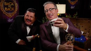 Guillermo gleefully shoots tequila with the 2022 Emmy winners